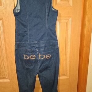 Bebe Denim Jumpsuit with Gold Logo